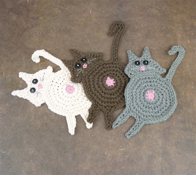 Crochet cat butt coasters.