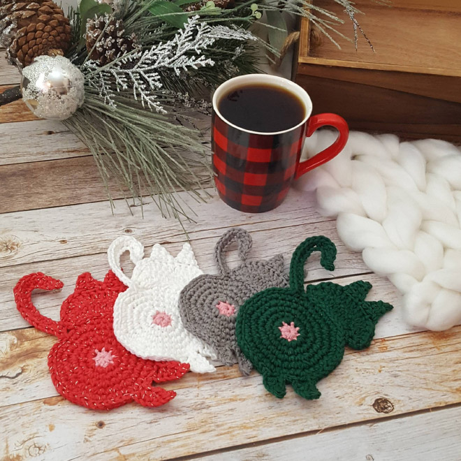 Crochet cat butt coasters.