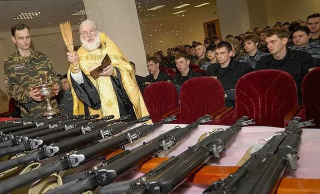 Russian priests really love blessing weapons.