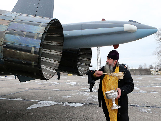 Russian priests really love blessing weapons.