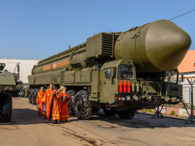 Russian priests really love blessing weapons.