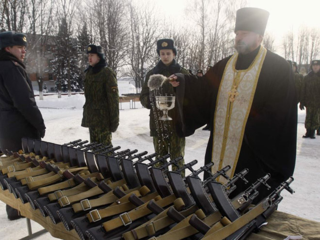 Russian priests really love blessing weapons.