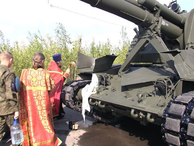 Russian priests really love blessing weapons.