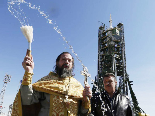 Russian priests really love blessing weapons.