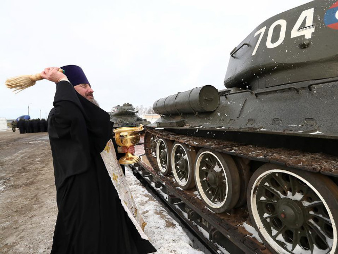 Russian priests really love blessing weapons.