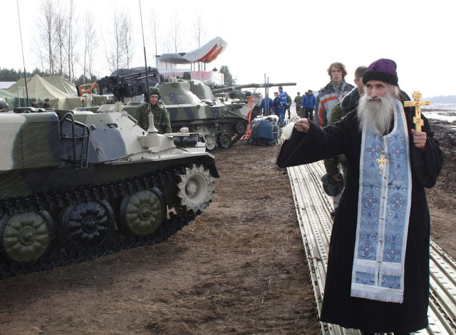 Russian priests really love blessing weapons.