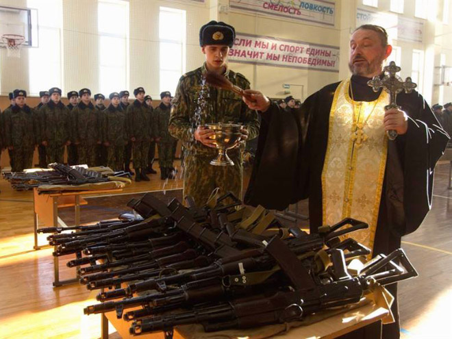 Russian priests really love blessing weapons.