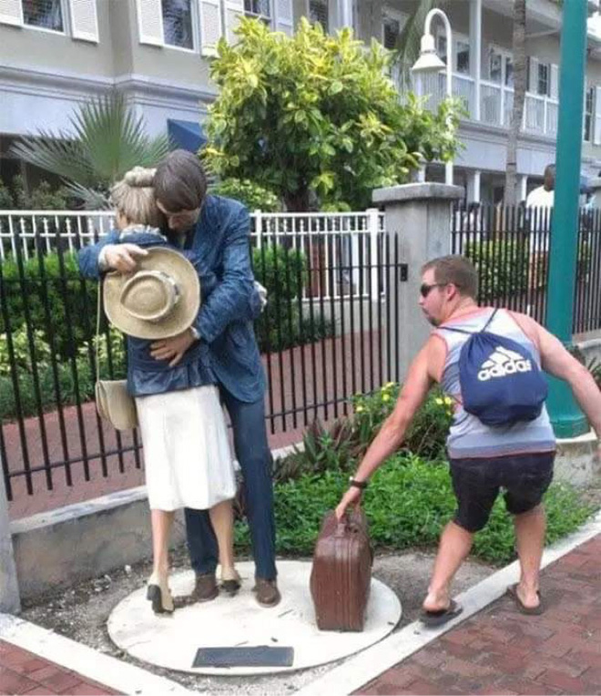 What's the point of having statues if you can't have fun with them for the sole purpose of making funny photos to share online?
