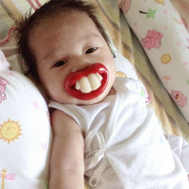 Funny teeth pacifier.