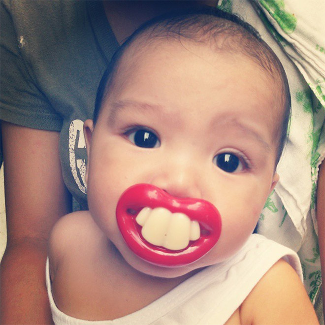 Funny teeth pacifier.