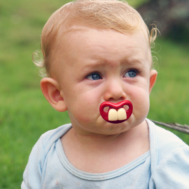 Funny teeth pacifier.