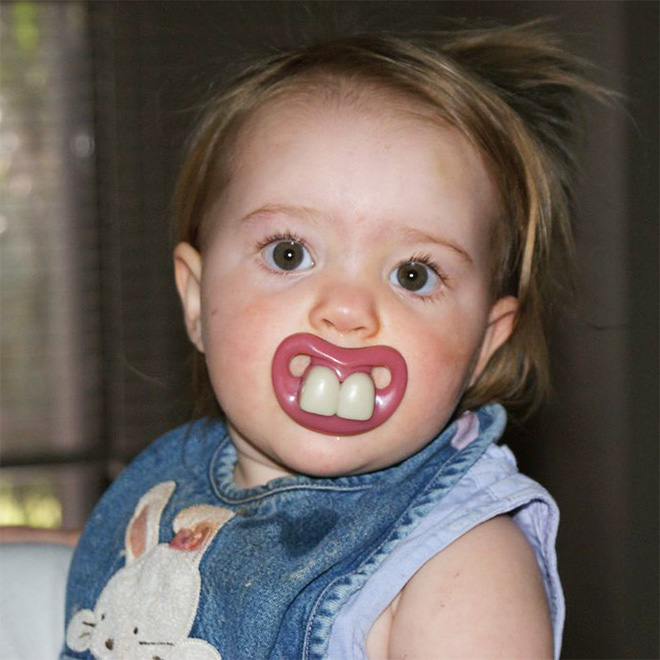 Funny teeth pacifier.