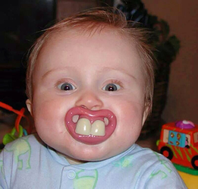 Funny teeth pacifier.