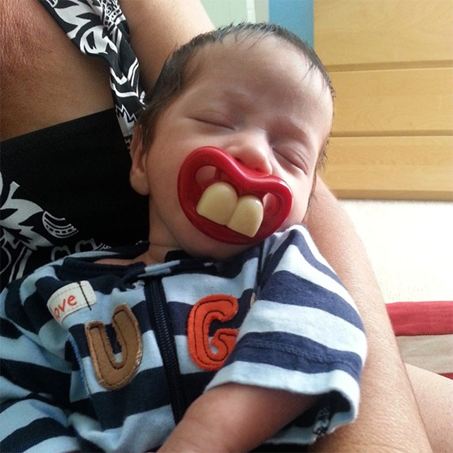 Funny teeth pacifier.