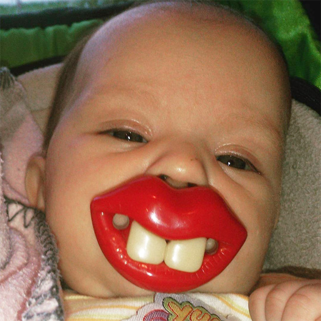 Funny teeth pacifier.