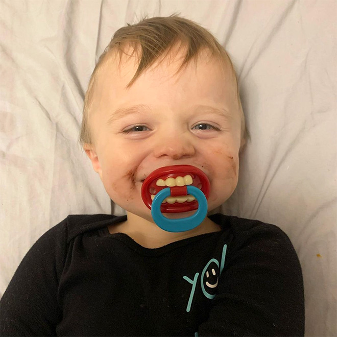 Funny teeth pacifier.