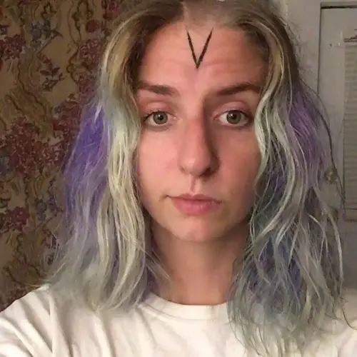 Reverse mohawk haircut.
